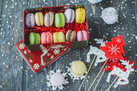 Christmas macarons with a crushed candy cane fillingの写真素材