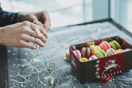 Christmas macarons with a crushed candy cane fillingの写真素材