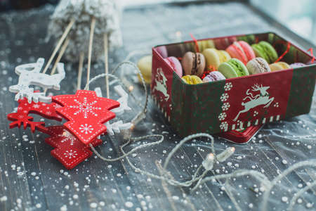 Christmas macarons with a crushed candy cane fillingの写真素材