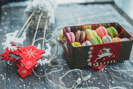 Christmas macarons with a crushed candy cane fillingの写真素材