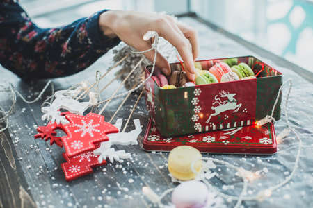 Christmas macarons with a crushed candy cane fillingの写真素材