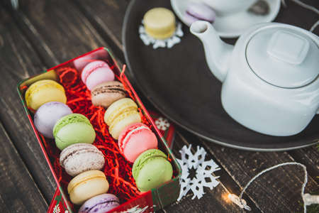 Christmas macarons with a crushed candy cane fillingの写真素材
