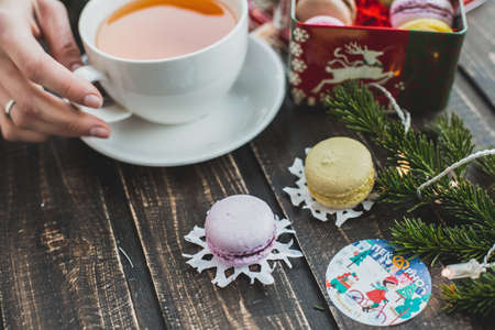 Christmas macarons with a crushed candy cane fillingの写真素材