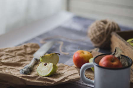 Apple on wooden board outdoors