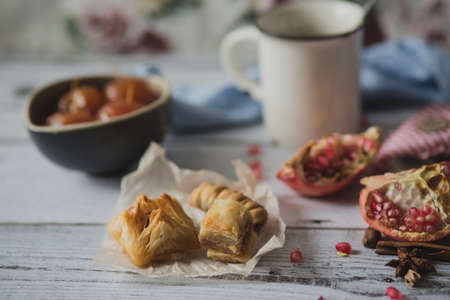 tea, fruit, fabric on wooden backgroundの写真素材