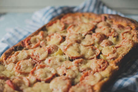 Home made artisan veggie pizza pie with onions peppersの写真素材