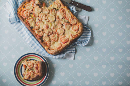 Home made artisan veggie pizza pie with onions peppersの写真素材
