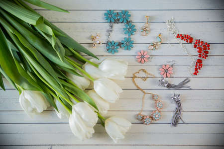 Beautiful female bracelet with stones, beads and flowersの写真素材