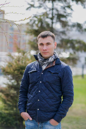 Portrait of a young handsome man, model of fashionの写真素材