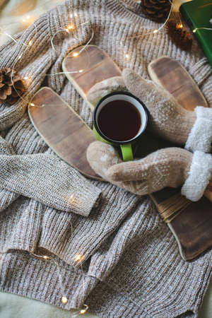 Christmas composition with a cactus tray and a cup, flat layの写真素材
