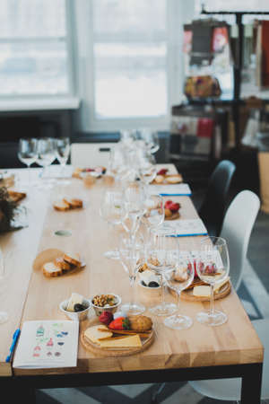 Table setting with wine and snacks, etiquetteの写真素材