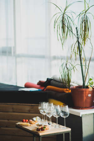 Table setting with wine and snacks, etiquetteの写真素材