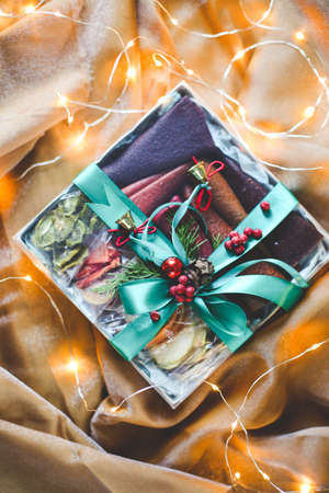 Christmas - a group of gifts on the background of garlands. close-up
