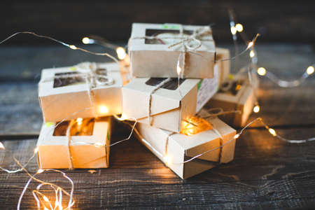 Christmas - a group of gifts on the background of garlands.