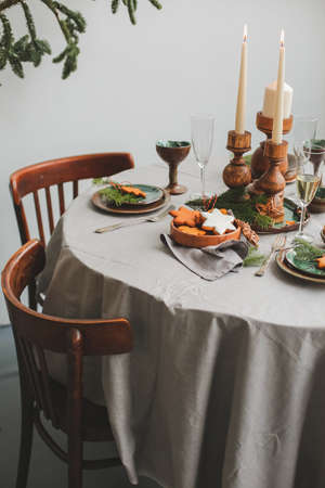 Table served for Christmas dinner in living room, close up view.の写真素材