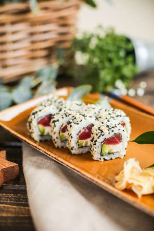 sushi with salmon and avocado. Sushi roll with salmon and tempura shrimpの写真素材