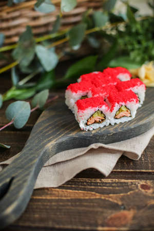 sushi with salmon and avocado. Sushi roll with salmon and tempura shrimpの写真素材