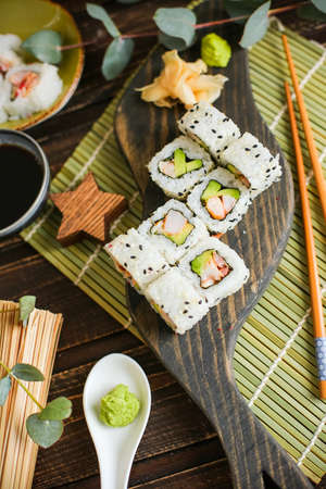 sushi with salmon and avocado. Sushi roll with salmon and tempura shrimpの写真素材