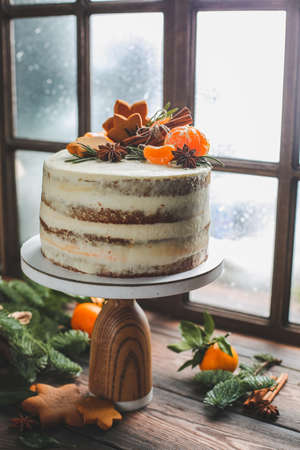 Christmas table setting with chocolate cherry cake and sugar cookies. See seriesの写真素材