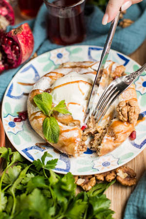 round cake in oriental style with a scoop of ice creamの写真素材