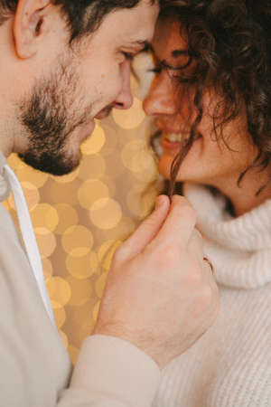 Young romantic couple close up in backlightの写真素材