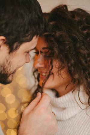 Young romantic couple close up in backlightの写真素材