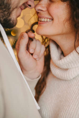 Young romantic couple close up in backlight