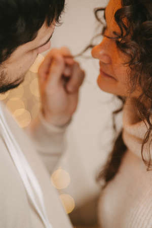 Young romantic couple close up in backlightの写真素材