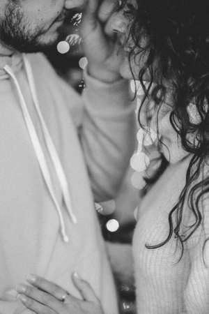 Young romantic couple close up in backlightの写真素材