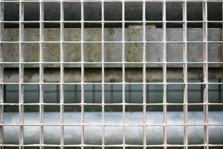 Jail metallic window with small quadrants diagonal strait lines macro background fine art high quality prints products fifty megapixelsの写真素材