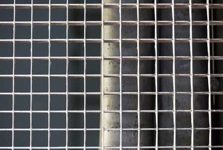 Jail metallic window with small quadrants diagonal strait lines macro background fine art high quality prints products fifty megapixelsの写真素材