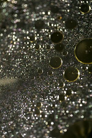 Oil bubbles on water macro background fifty megapixels high qualityの写真素材