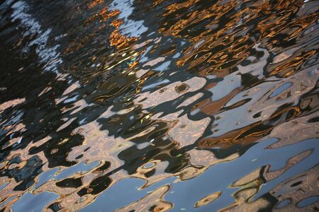 Buildings reflection on canal water amsterdam high qualityの写真素材