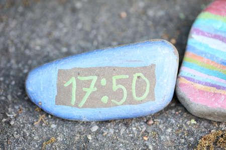 Dorsten, Germany, Monday 18 May 2020 small stones pained from kinds covid-19 season high quality...