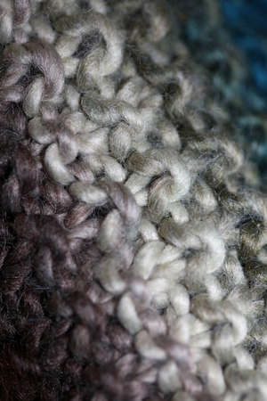 Colorful handmade winter scarf with alpacas wool macro background modern high quality printの写真素材