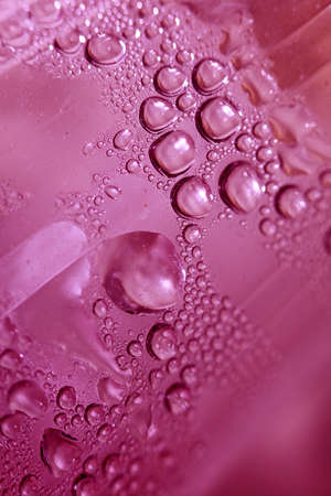 Water droplets macro beside the glass surface close up liquid drops modern background pattern high quality printsの写真素材