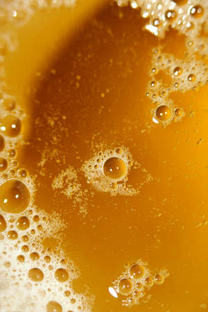 Water bubbles in liquid close up modern macro yellow background high quality prints