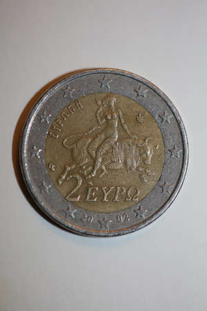 Macro shots of euro coins background 2 Euro coin year of manufacture 2002 country Greece high...