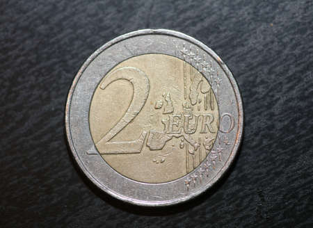 Macro shots of euro coins background 2 Euro coin year of manufacture 2002 country Greece high...
