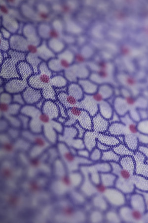 Violet purple textile design with colorful flowers close up background high quality big size instant printingsの写真素材