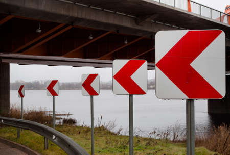 Red arrow road sign
