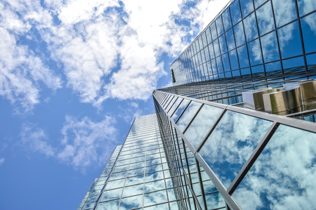 Ottawa, Canada - September 2, 2016: The glass skyscrapper reflecting the clouds in Ottawa downtown