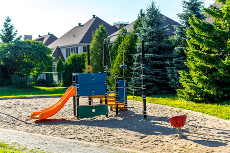 Modern children playground in park in Canadaの写真素材