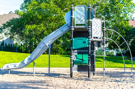 Modern children playground in park in Canadaの写真素材