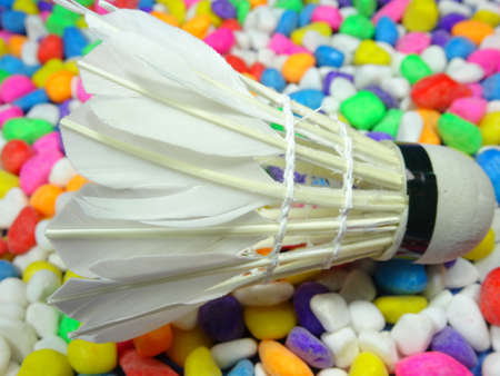 A shuttlecock in colourful stone background. Photo taken in Malaysia, south east asiaの写真素材