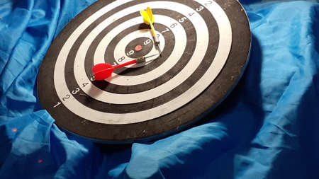 dart board on   blue background. photo taken in malaysia