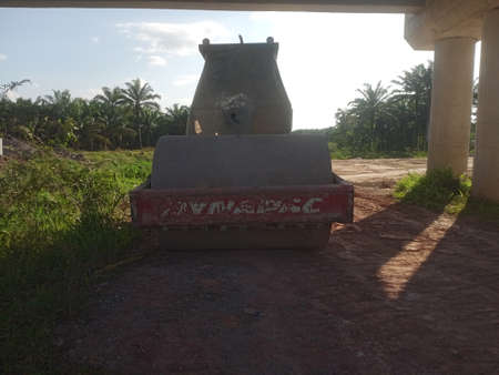 Old rusty oil tank on the road