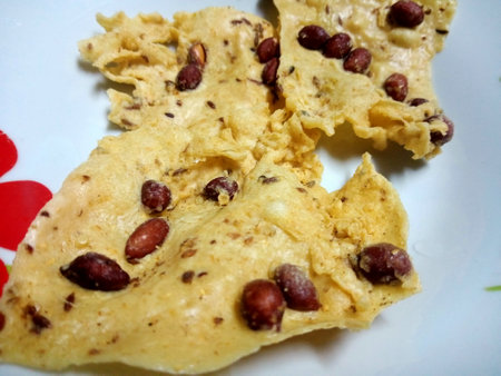 Crispy Peanut Snack or Rempeyek or peyek is a deep-fried savoury Indonesian-Javanese cracker close up. photo taken in malaysiaの写真素材
