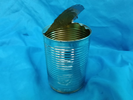 metal tin  can on a blue background. Close-up  of can  view.photo taken in malaysia