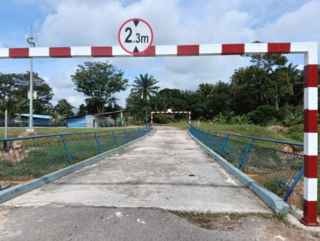 Concrete bridge with height 2.3m limit  with blue sky and white cloud background.photo taken in...